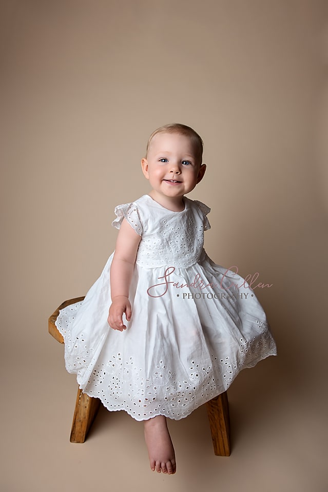 Smiling toddler by Sandra Cullen Photography